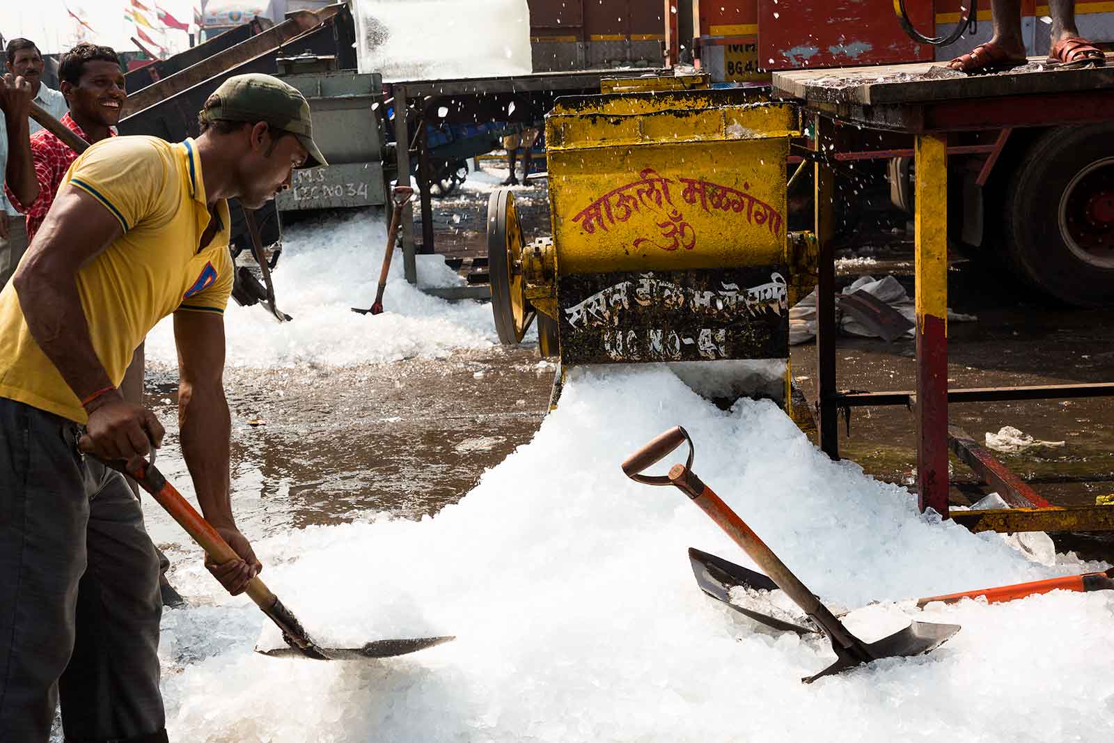 Where there's fresh fish, there needs to be crushed ice. While fish is unloaded off the boats, tons of ice is crushed to keep the fish fresh at the Sassoon Docks.