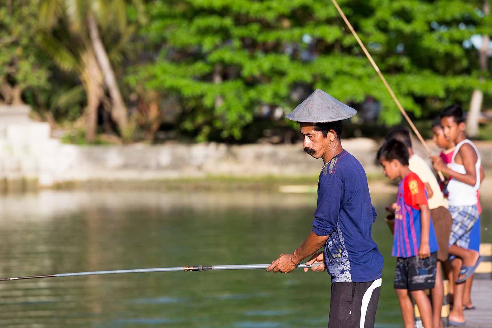 Maluku Islands: Fishermen along the jetty can be seen pretty much everywhere along the islands.