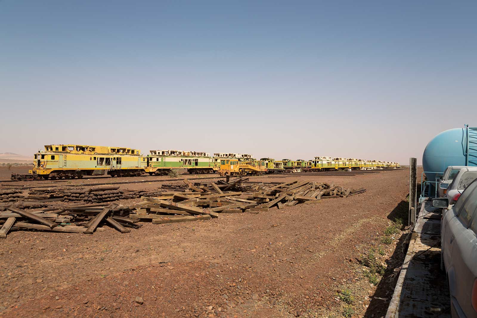 While the Iron Ore Train snakes its way through Mauritania, you'll come across wrecks from all sorts of vehicles - here, old Diesel locomotives that were once in use have been parked.
