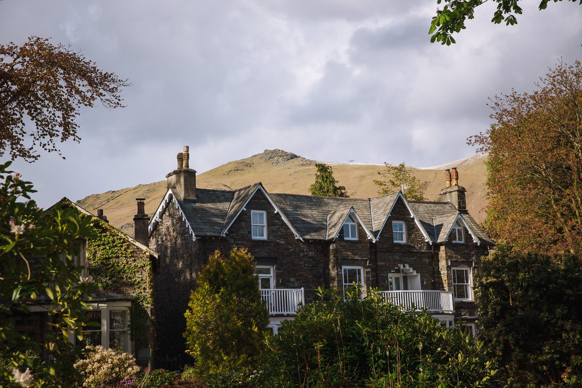 Cute houses surrounded by hills in Grasmere, Lake District